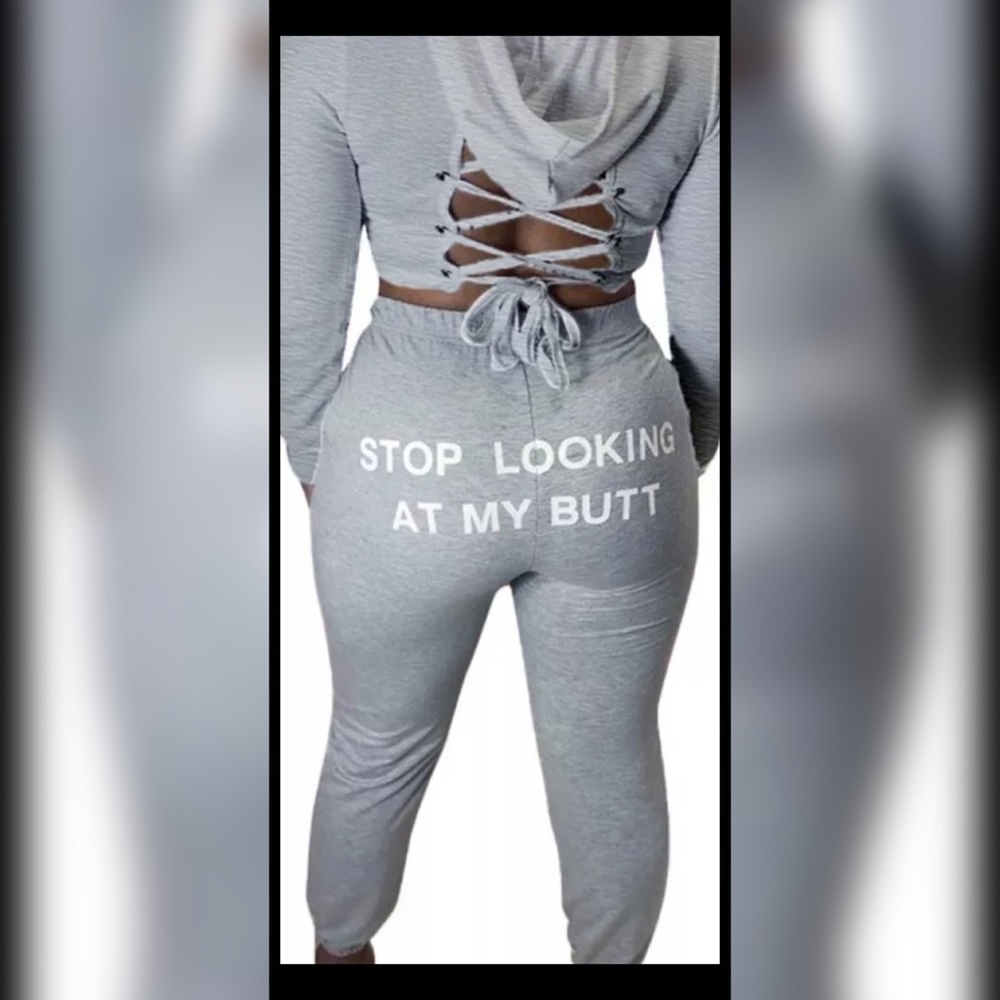 2 pc lace up back sweat suit .